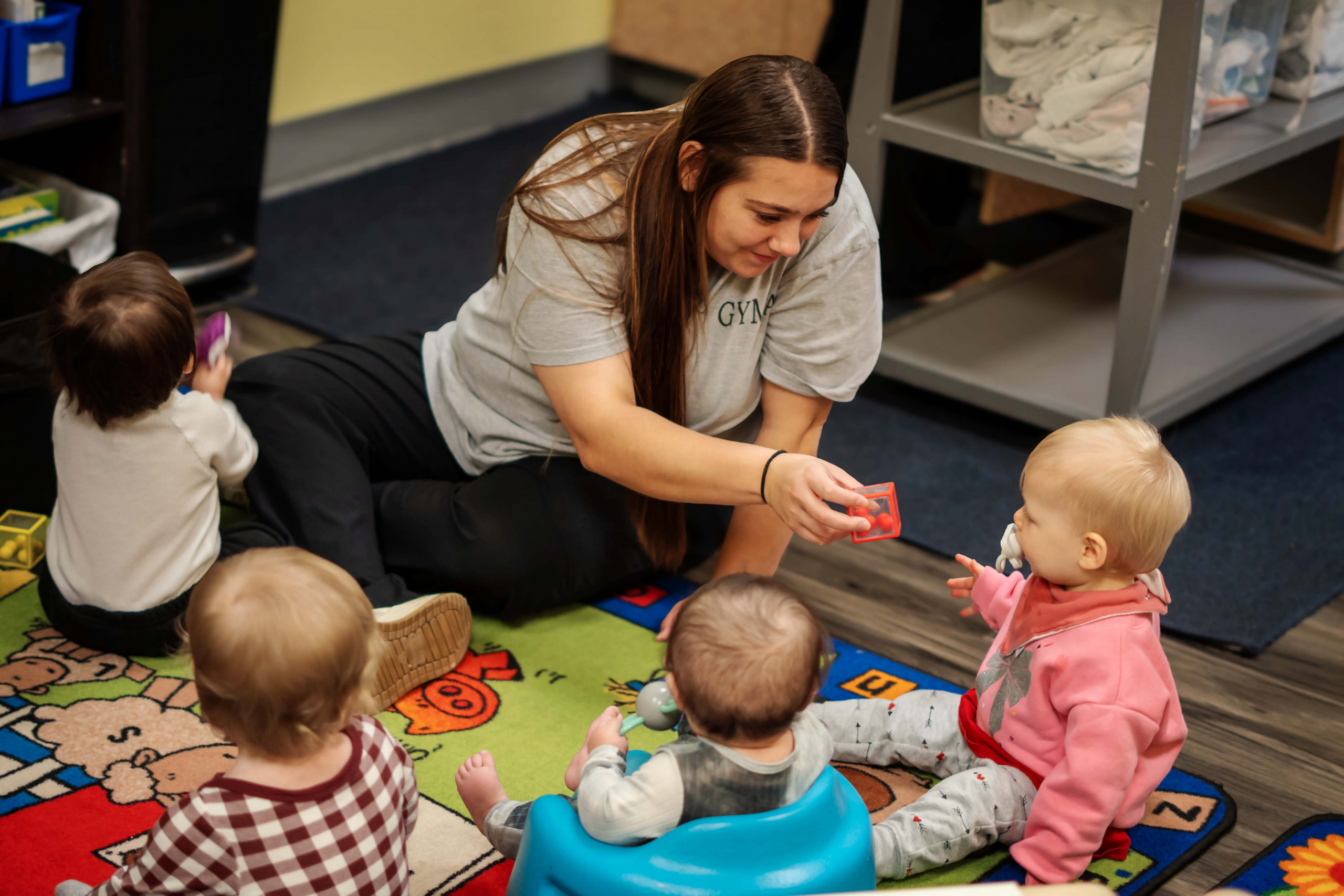 Children learning together in a classroom at Grow Your Mind Academy